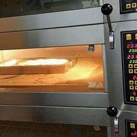 烤箱上下预热230度…放入面包，喷蒸汽4秒，定时23分钟