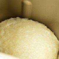 约1小时后，米已熟且搅拌成团，可加10分钟再次搅拌上劲